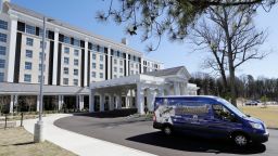 A tour bus leaves the Guest House at Graceland hotel on Thursday, March 2, 2017, in Memphis, Tenn. The $90 million, 450-room hotel that opened last year is part of a $140 million expansion at Graceland, Elvis Presley's longtime home. (AP Photo/Mark Humphrey)