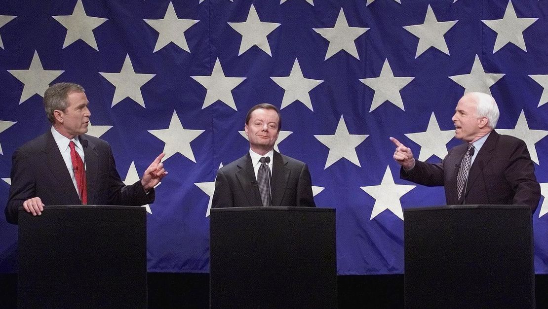 Republican Presidential nomination hopefuls (L-R) George W. Bush, Gary Bauer, and John McCain debate in January 2000.