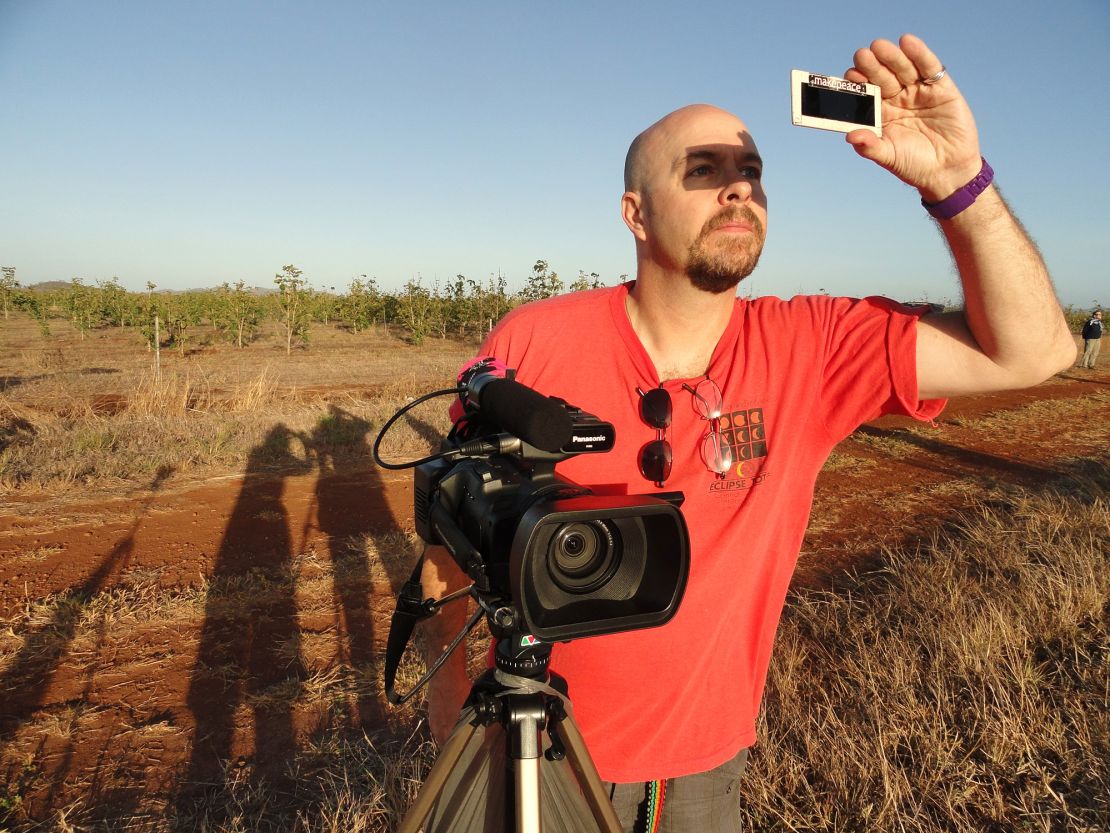 Filmmaker David Makepeace observing a total solar eclipse in Australia in November 2012.