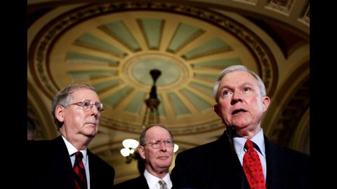 Sessions speaks to reporters in 2009. He is accompanied by Senate Minority Leader Sen. Mitch McConnell of Kentucky, left, and Sen. Lamar Alexander, R-Tennessee.