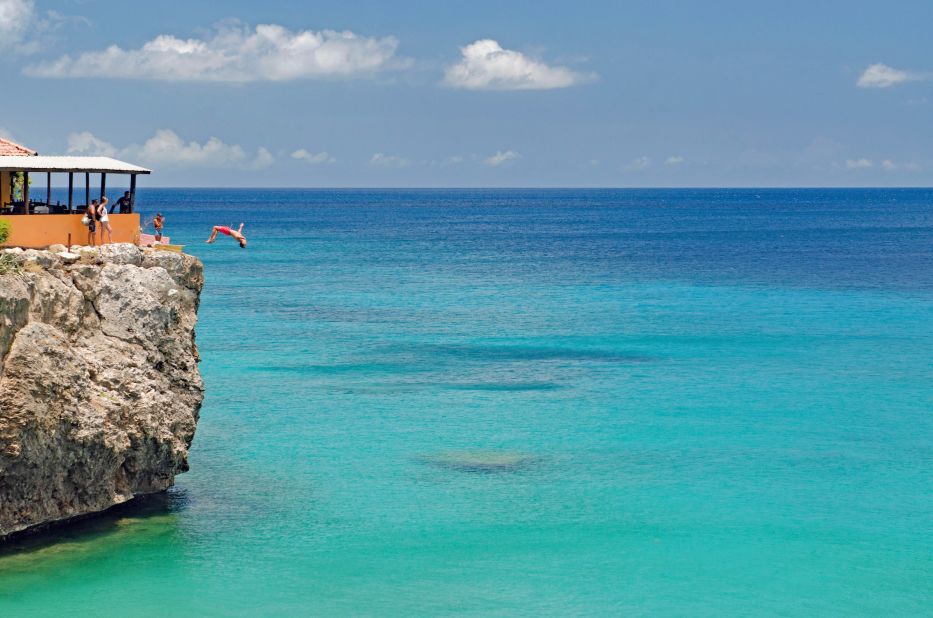 <strong>Take a leap!</strong> Jumping off the 40-foot cliff at Playa Forti is a Curaçao bucket list item -- or you can just watch from a distance. 
