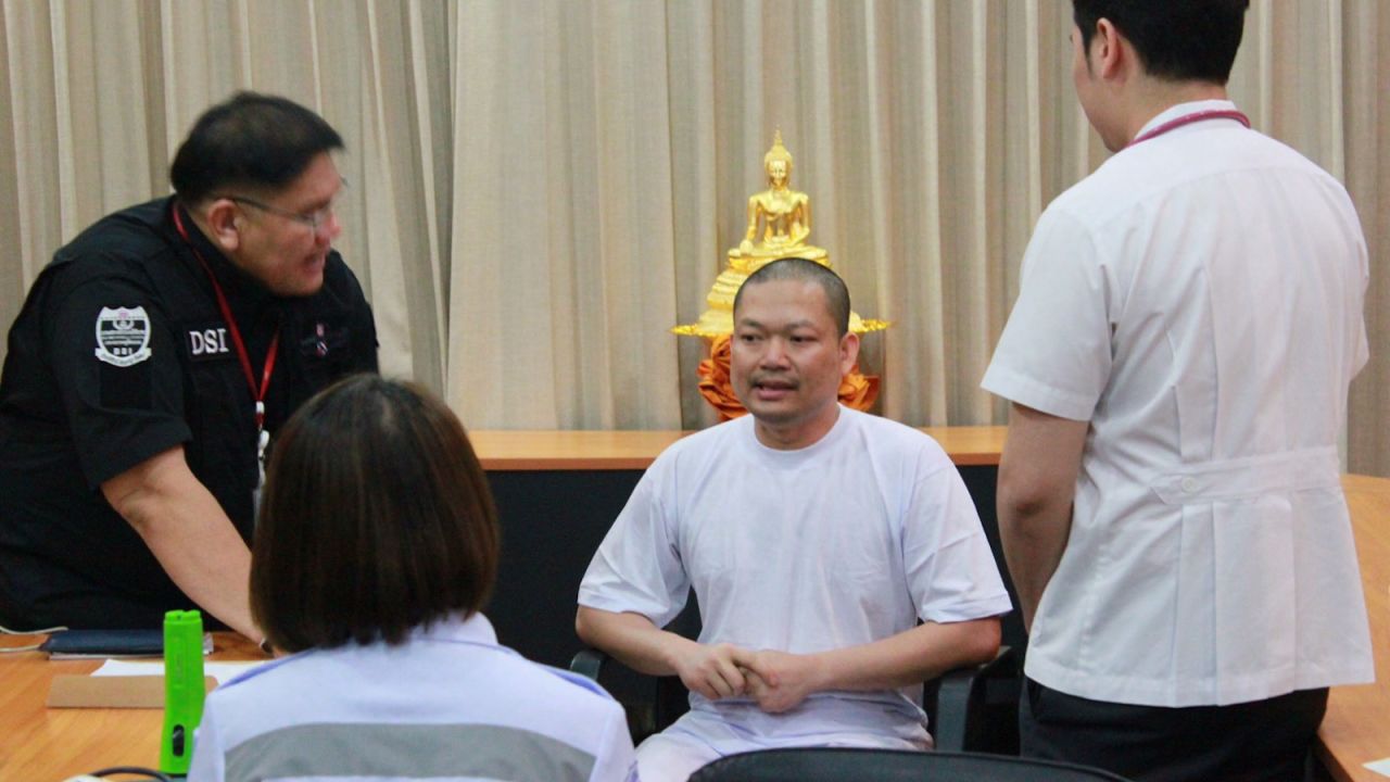 Former monk Wiraphon Sukphon arrives back in Bangkok following his extradition from the United States on July 19, 2017.