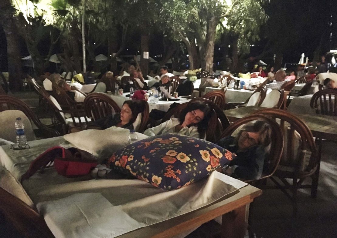 Vactioners across the region abandoned their hotel rooms -- as seen here in Bitez, a resort town west of Bodrum in Turkey -- amid the aftershocks on Friday morning. 
