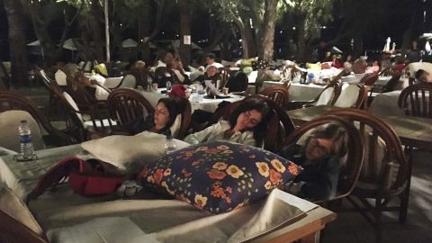 Vactioners across the region abandoned their hotel rooms -- as seen here in Bitez, a resort town west of Bodrum in Turkey -- amid the aftershocks on Friday morning. 