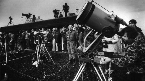 On February 26, 1979, eclipse enthusiasts, photographers and television crews gather to watch the solar eclipse in Goldendale, Washington.