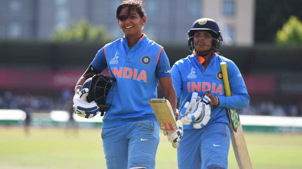 Harmanpreet Kaur (left) hit seven sixes on her way to an historic 171 not out.