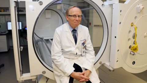 Dr. Paul Harch sitting in the hyperbaric oxygen therapy chamber.