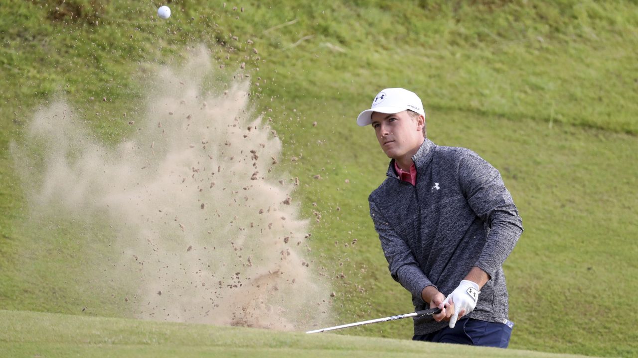 Spieth answered Grace's challenge with a 65 to take a three-shot lead into the final round at Royal Birkdale.