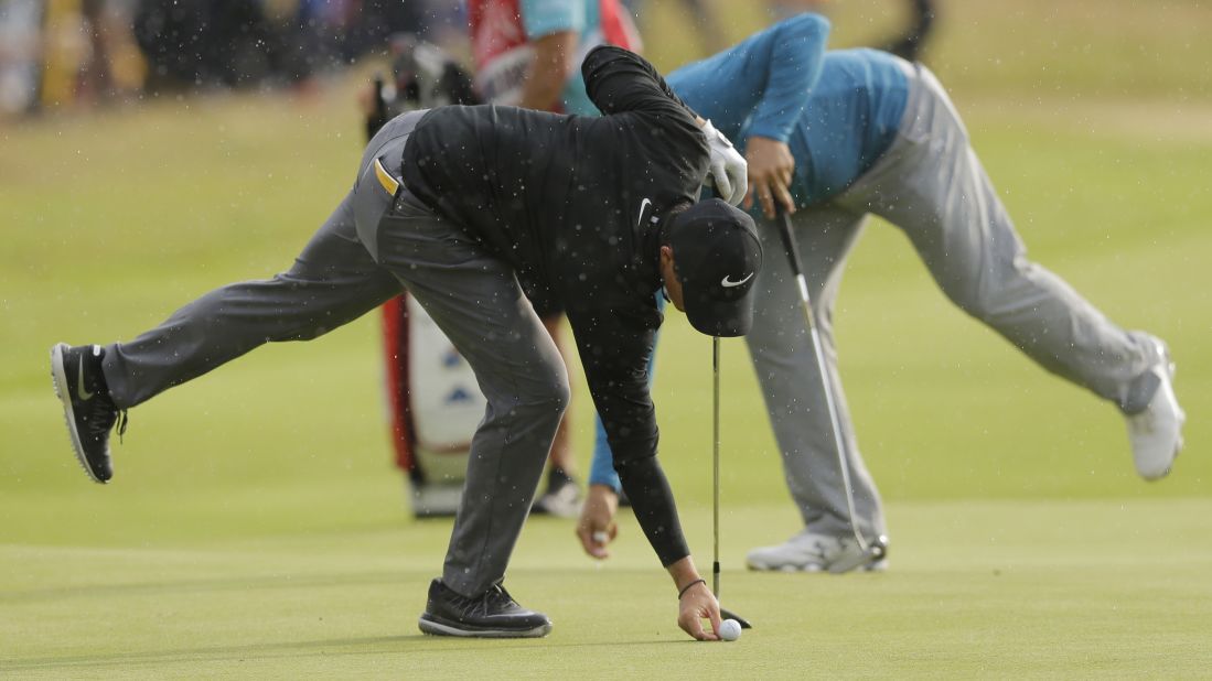 McIlroy, left, and Gary Woodland of the United States gave chase but couldn't make any inroads into the leaders.