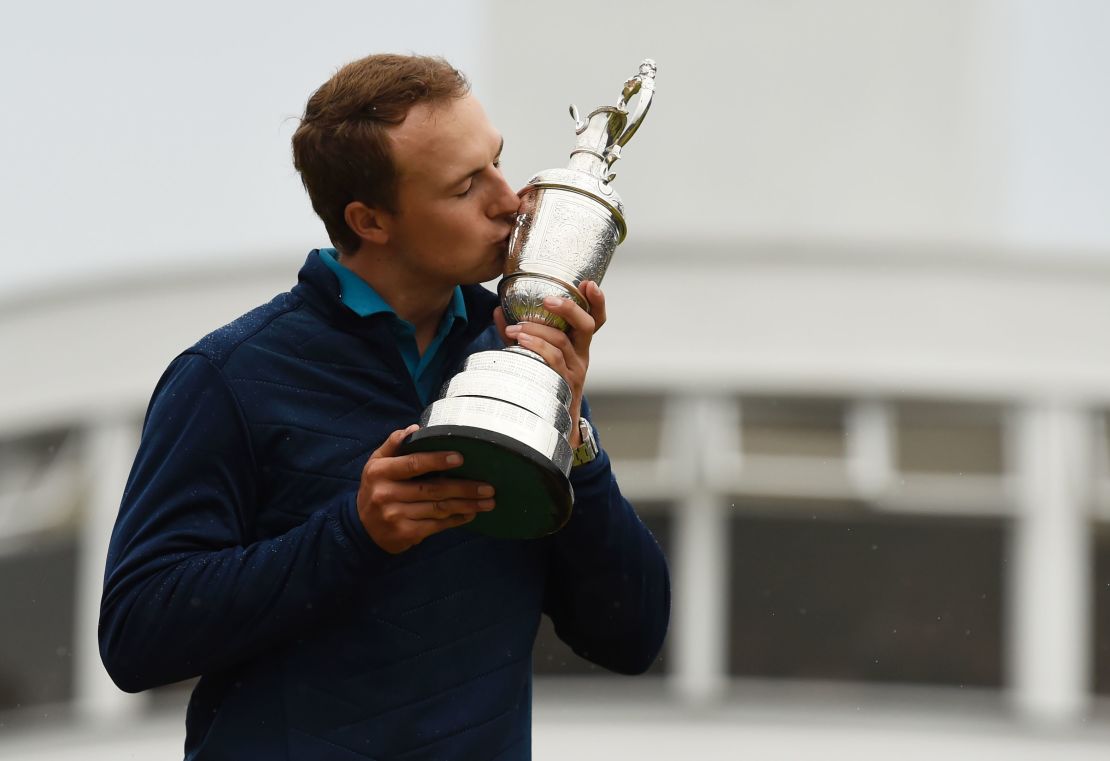 US golfer Jordan Spieth poses for pictures as he kisses the Claret Jug after winning the 2017 British Open Golf Championship at Royal Birkdale.