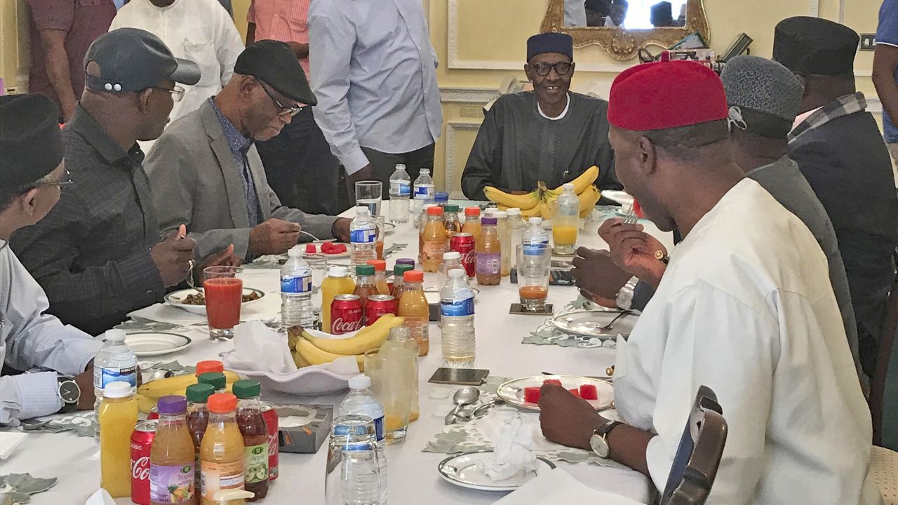 Nigeria's President Muhammadu Buhari is seen having lunch with senior members of the country's ruling party All Progressives Congress (APC) in Abuja house, London.