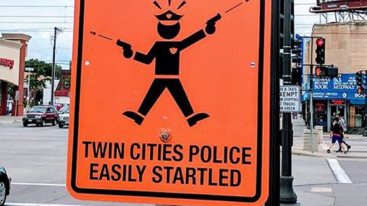 This street sign, warning of "easily startled" Twin Cities police, was put up on a corner in St. Paul, Minnesota. Another was put up in Minneapolis.
