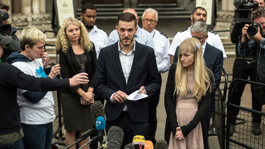 LONDON, ENGLAND - JULY 24:  Chris Gard and Connie Yates, the parents of terminally ill baby Charlie Gard, speak to the media outside following their decision to end their legal challenge to take him to the U.S for experimental treatment, outside The Royal Courts of Justice on July 24, 2017 in London, England. The parents of terminally-ill baby Charlie Gard have ended their legal challenge after an American doctor said it was too late to give him nucleoside therapy.  (Photo by Carl Court/Getty Images)