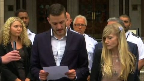 Charlie Gard reads a statement outside the court on Monday. 