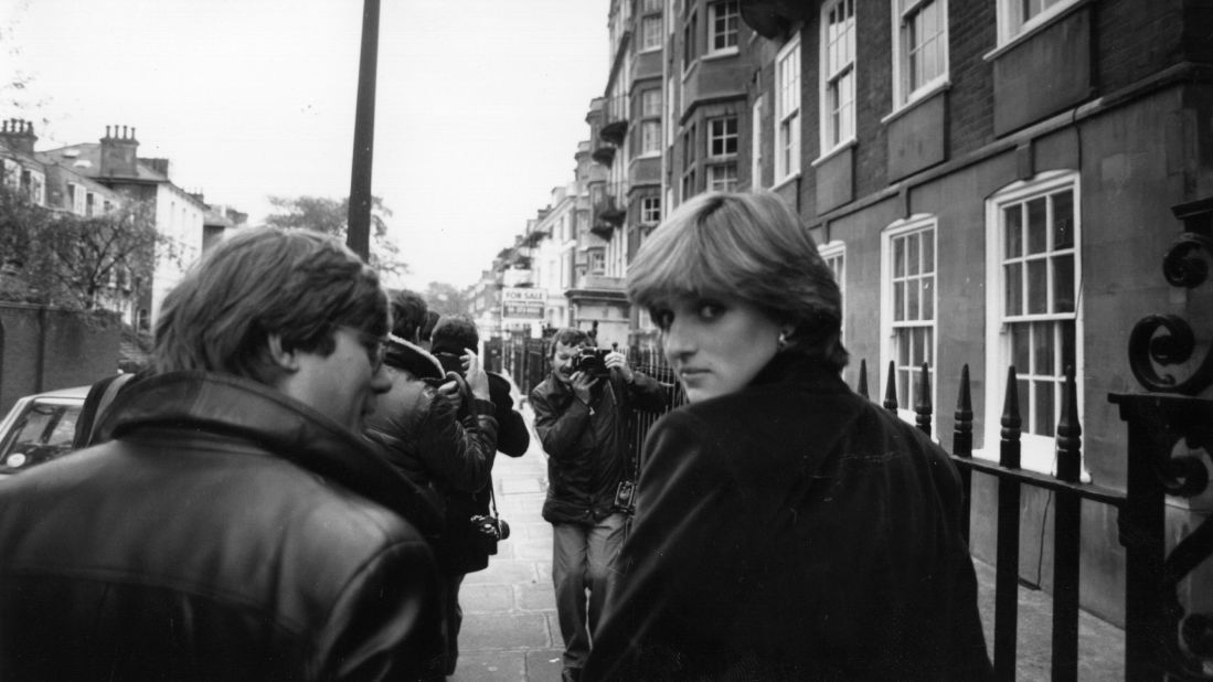 Diana is surrounded by photographers shortly before it was announced that she was engaged to Prince Charles.