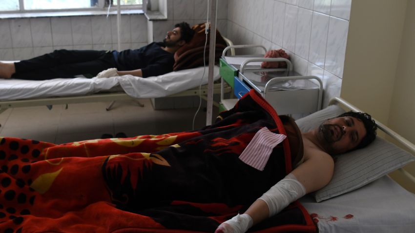 Afghan men rest in a hospital after being injured in a car bomb attack in Kabul on July 24, 2017.
At least 24 people have been killed and 42 wounded after a car bomb struck a bus carrying government employees in western Kabul on July 24, an official told AFP, the latest attack to strike the Afghan capital.
 / AFP PHOTO / SHAH MARAI        (Photo credit should read SHAH MARAI/AFP/Getty Images)
