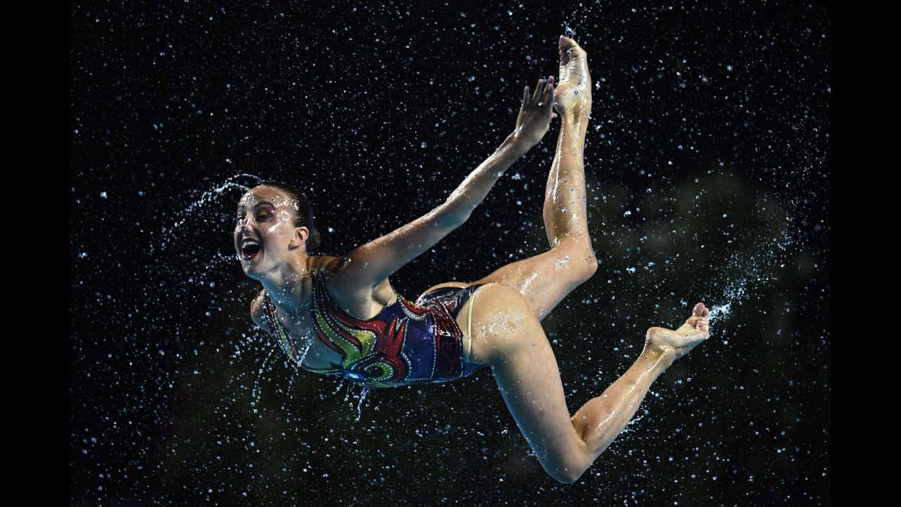 A synchronized swimmer from Russia performs at the FINA World Championships on Wednesday, July 19. The Russian women won gold in the team free routine.