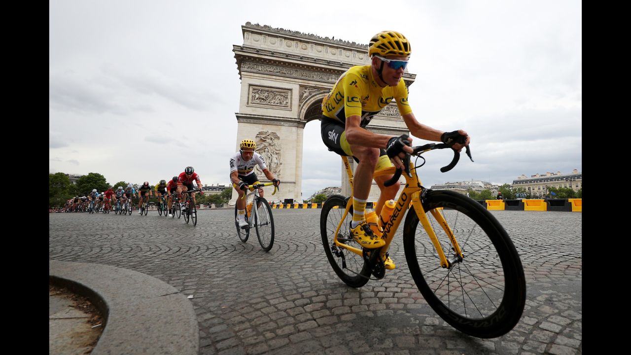 Chris Froome leads a pack of cyclists past Paris' Arc de Triomphe on his way to <a href="http://www.cnn.com/2017/07/23/sport/froome-wins-tour-de-france/index.html" target="_blank">winning the Tour de France</a> on Sunday, July 23. It was Froome's fourth Tour de France title and his third in a row.