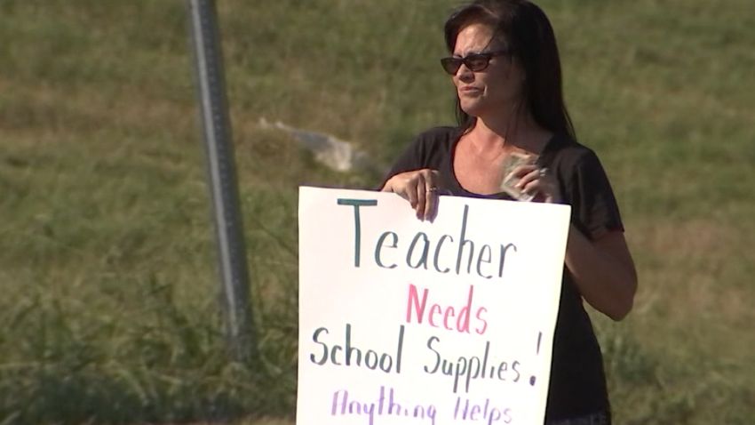 Tulsa OK Teacher Asks for Money on Roadside