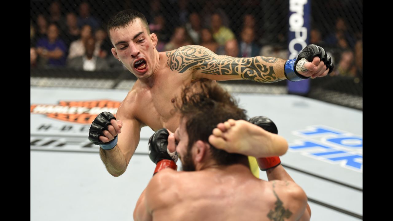 UFC fighter Thomas Almeida kicks Jimmie Rivera during their bantamweight fight in Uniondale, New York, on Saturday, July 22. Rivera won by unanimous decision and remains undefeated in the UFC.