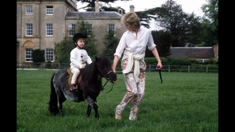 William rides a miniature pony at Highgrove House.