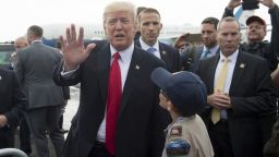 US President Donald Trump greets well wishers upon arrival on Air Force One at Raleigh County Memorial Airport in Beaver, West Virginia, July 24, 2017, as Trump travels to speak at the National Boy Scout Jamboree in West Virginia. / AFP PHOTO / SAUL LOEB        (Photo credit should read SAUL LOEB/AFP/Getty Images)