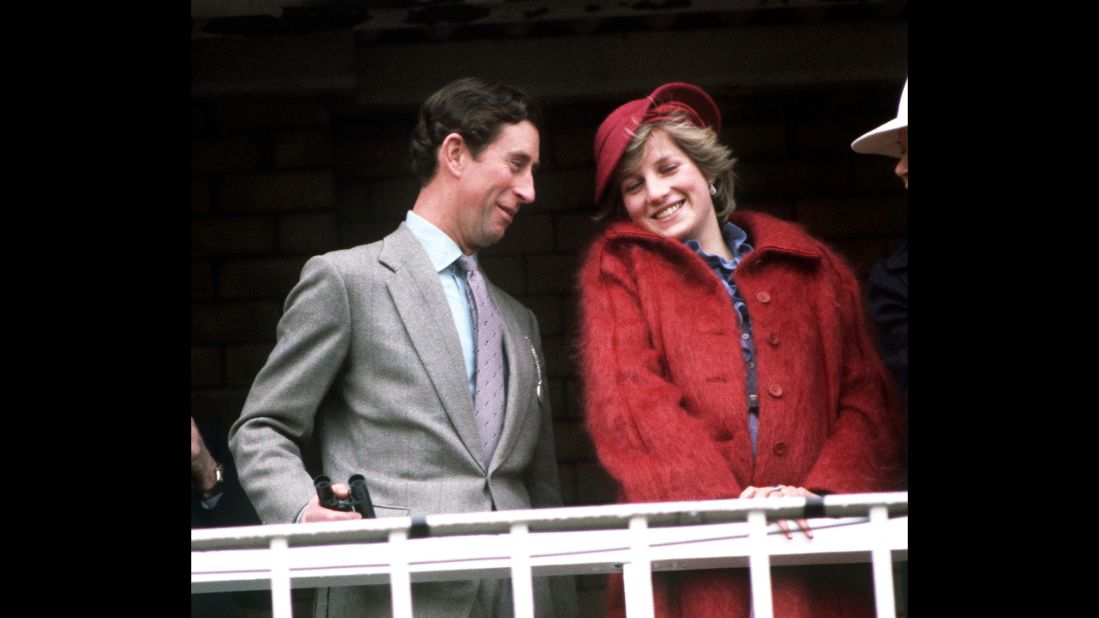 Charles and Diana attend the Grand National horse race in April 1982.