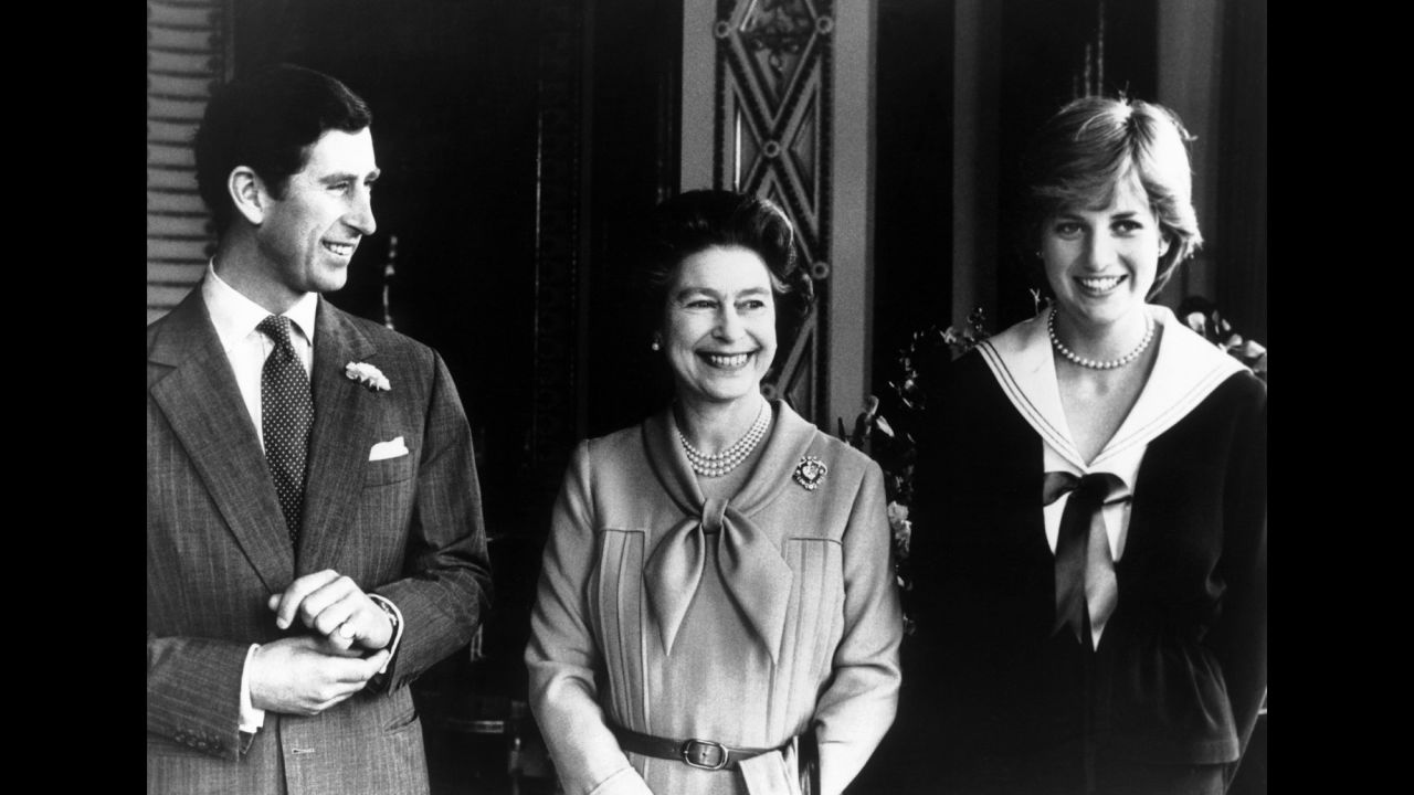 The couple poses with Charles' mother, Queen Elizabeth II, in March 1981.