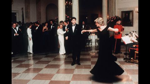 Diana dances with actor John Travolta at the White House in November 1985. Dancing behind Travolta are US President Ronald Reagan and first lady Nancy Reagan. A few years ago, Diana's blue velvet dress -- nicknamed the 