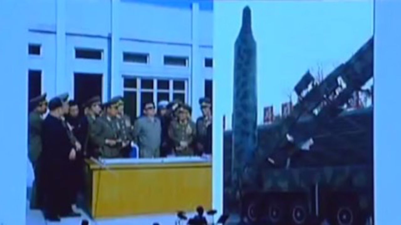 Former North Korean leader Kim Jong Il seen with other military figures. 