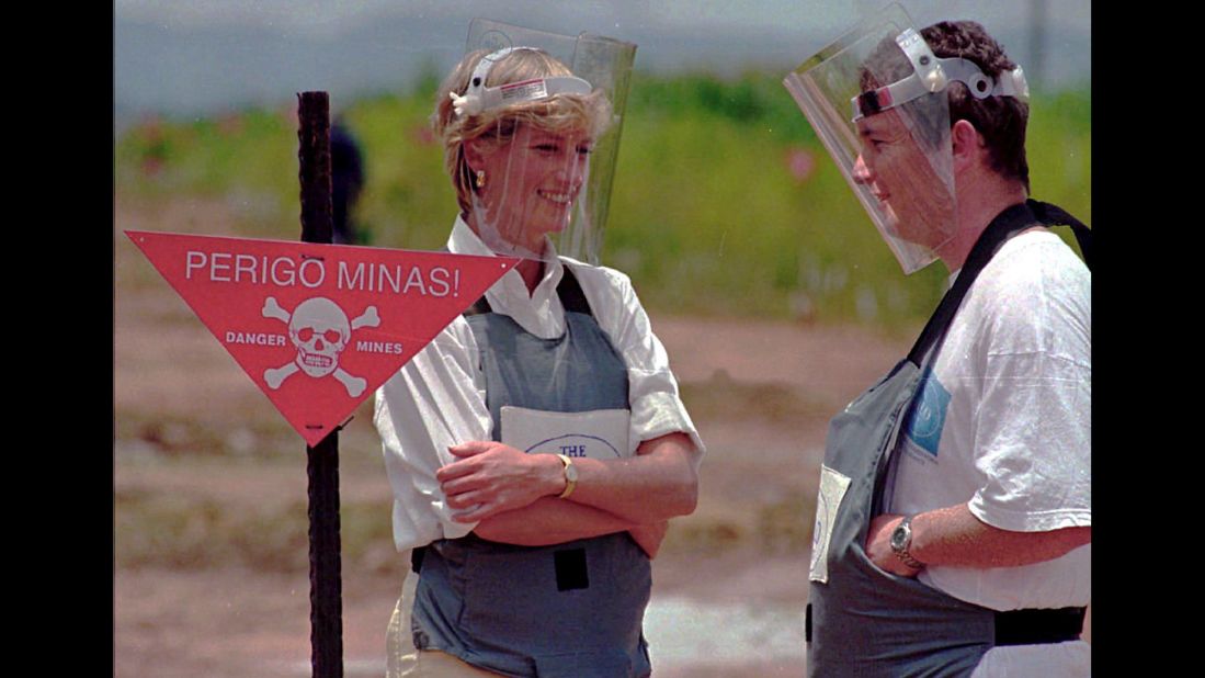 Diana wears protective gear as she visits minefields in Angola in January 1997.