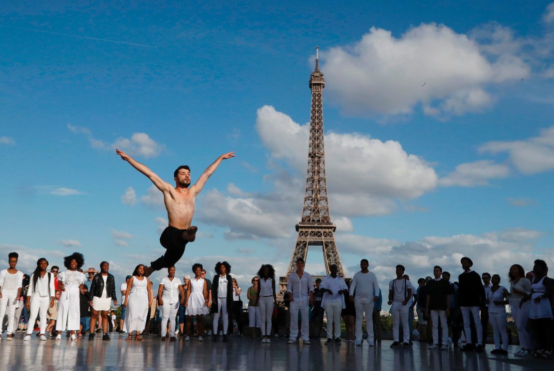 Joudeh performs to 'Dance or Die' on the Human Rights Square, near the Eiffel Tower.
