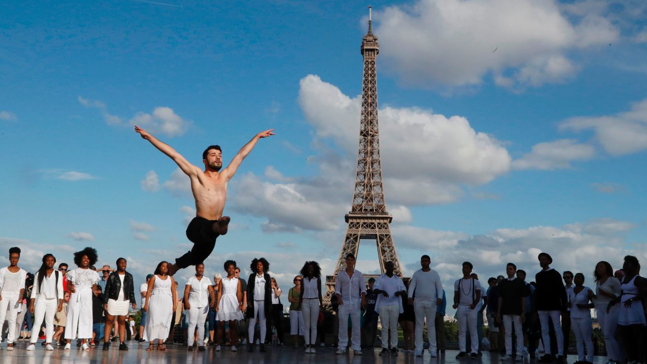 Joudeh performs to 'Dance or Die' on the Human Rights Square, near the Eiffel Tower.
