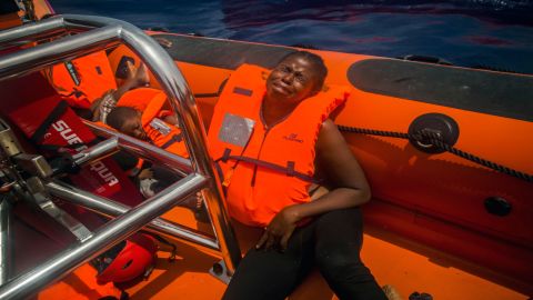 A woman migrant cries after being rescued by Spanish aid workers on Tuesday.