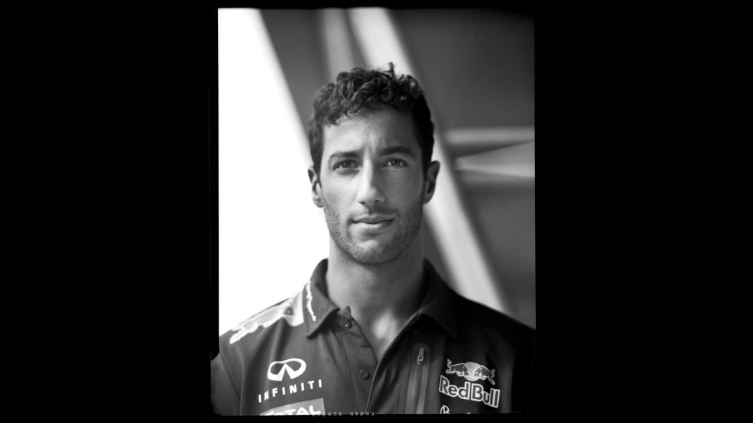 The photographer singles out this portrait of Red Bull driver Daniel Ricciardo as his favorite. "Daniel was very cool and very candid in front of the camera but he had this big smile on his face," Paul recalls. "I was just <em>trying</em> to get him not to smile!" 