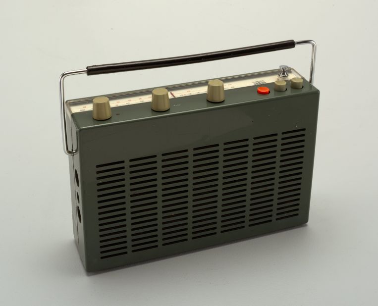 Before car manufacturers starting installing radios in their vehicles, this early portable radio was marketed to drivers, and could be carried or mounted in a car. 