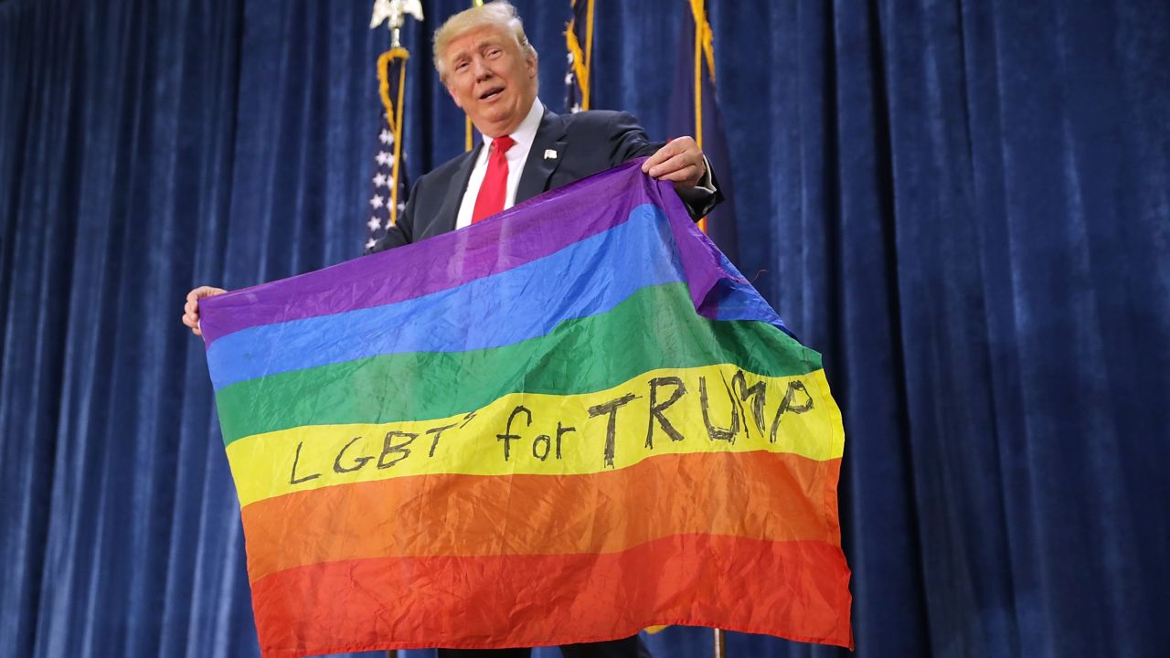 GREELEY, CO - OCTOBER 30:  Republican presidential nominee Donald Trump holds a rainbow flag given to him by supporter Max Nowak during a campaign rally at the Bank of Colorado Arena on the campus of University of Northern Colorado October 30, 2016 in Greeley, Colorado. With less than nine days until Americans go to the polls, Trump is campaigning in Nevada, New Mexico and Colorado.  (Photo by Chip Somodevilla/Getty Images)