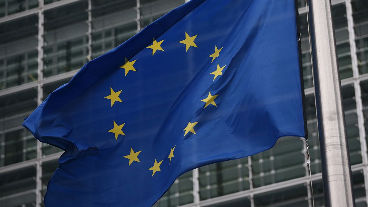 BRUSSELS, BELGIUM - OCTOBER 24:  European Union flags are pictured outside the European Commission building on October 24, 2014 in Brussels, Belgium. Alongside criticism from outgoing European Commission president Jose Manuel Barroso on the UK's stance on EU immigration and a plan to quit the European Court of Human Rights, the UK has now been told to pay an extra ?1.7bn GBP (2.1bn EUR) towards the EU's budget because its economy has performed better than expected.  (Photo by Carl Court/Getty Images)