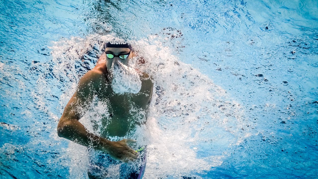 This image shows Italy's Gregorio Paltrinieri powering through the pool on his way to winning the men's 800m freestyle final.