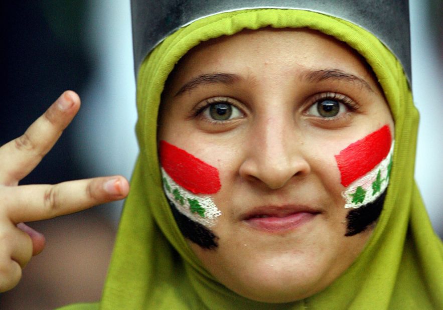 An Iraqi fan cheers for her team at the 2007 Asian Cup.