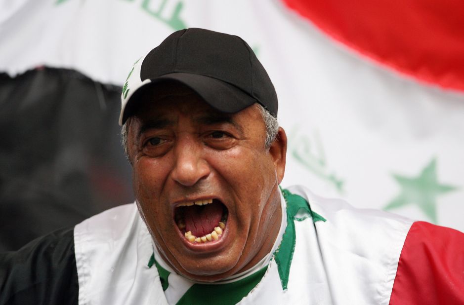 An Iraqi football fan supports his team before the semi-final match between Iraq and South Korea.