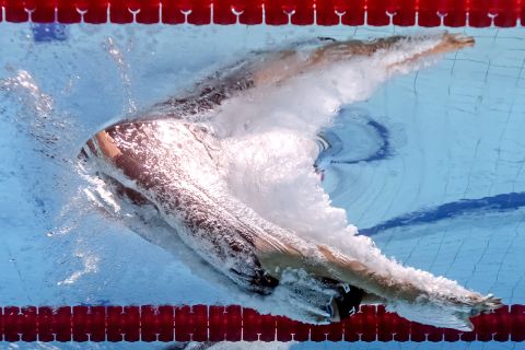 ... by viewing the competition from the perspective of an underwater camera the event has an altogether more surreal feeling. Here Dutch swimmer Ranomi Kromowidjojo is pictured competing in the women's 100 meter freestyle semifinal.