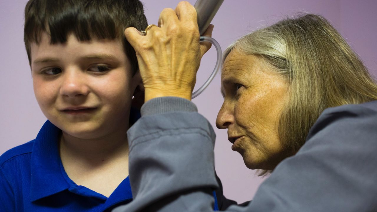 Dr. Elizabeth Curry, examining Micah Creamer, says she wrote to the Florida Agency for Health Care Administration, expressing her concerns about patients being kicked off Children's Medical Services, but the agency didn't respond.