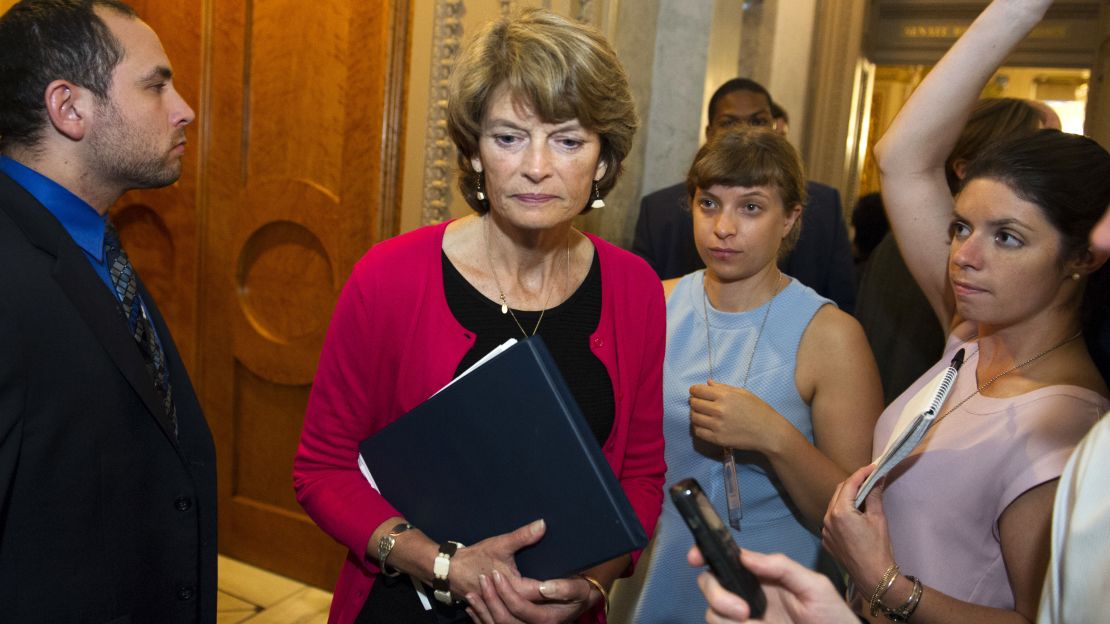 Sen. Lisa Murkowski, passes reporters as she leaves the Senate Chamber after voting 'no' on a a measure to repeal parts of former President Barack Obama's health care law, on Capitol Hill. 