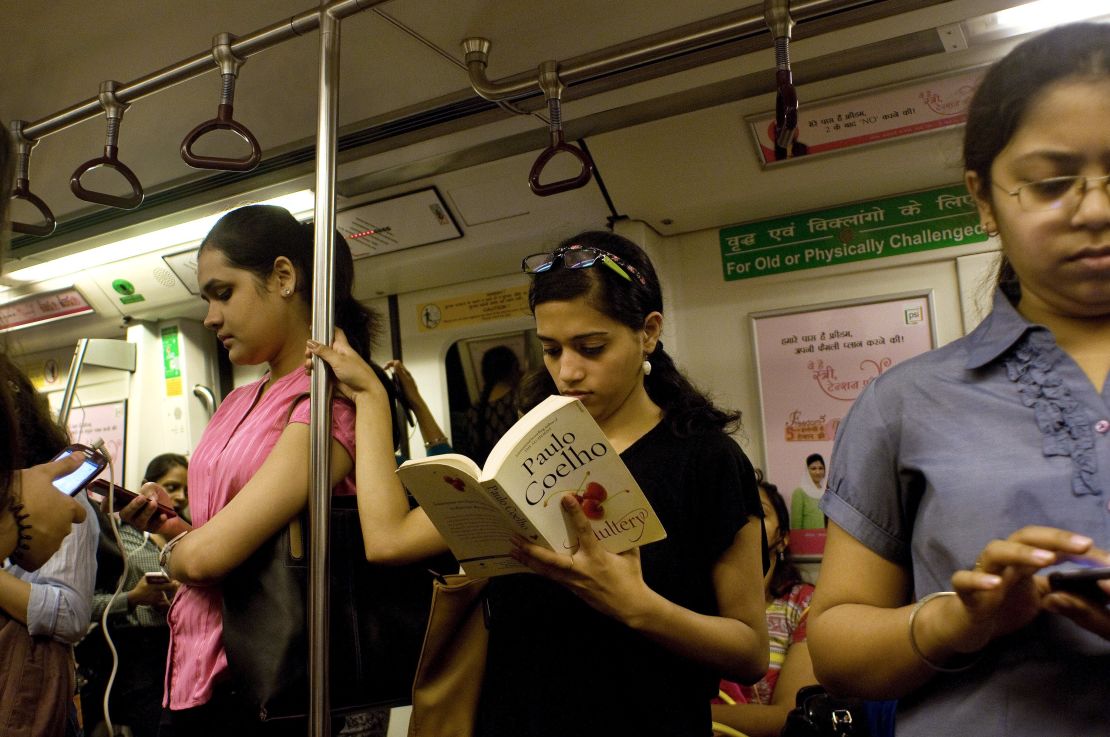 Indian women travel in the metro carriage reserved for women in New Delhi.