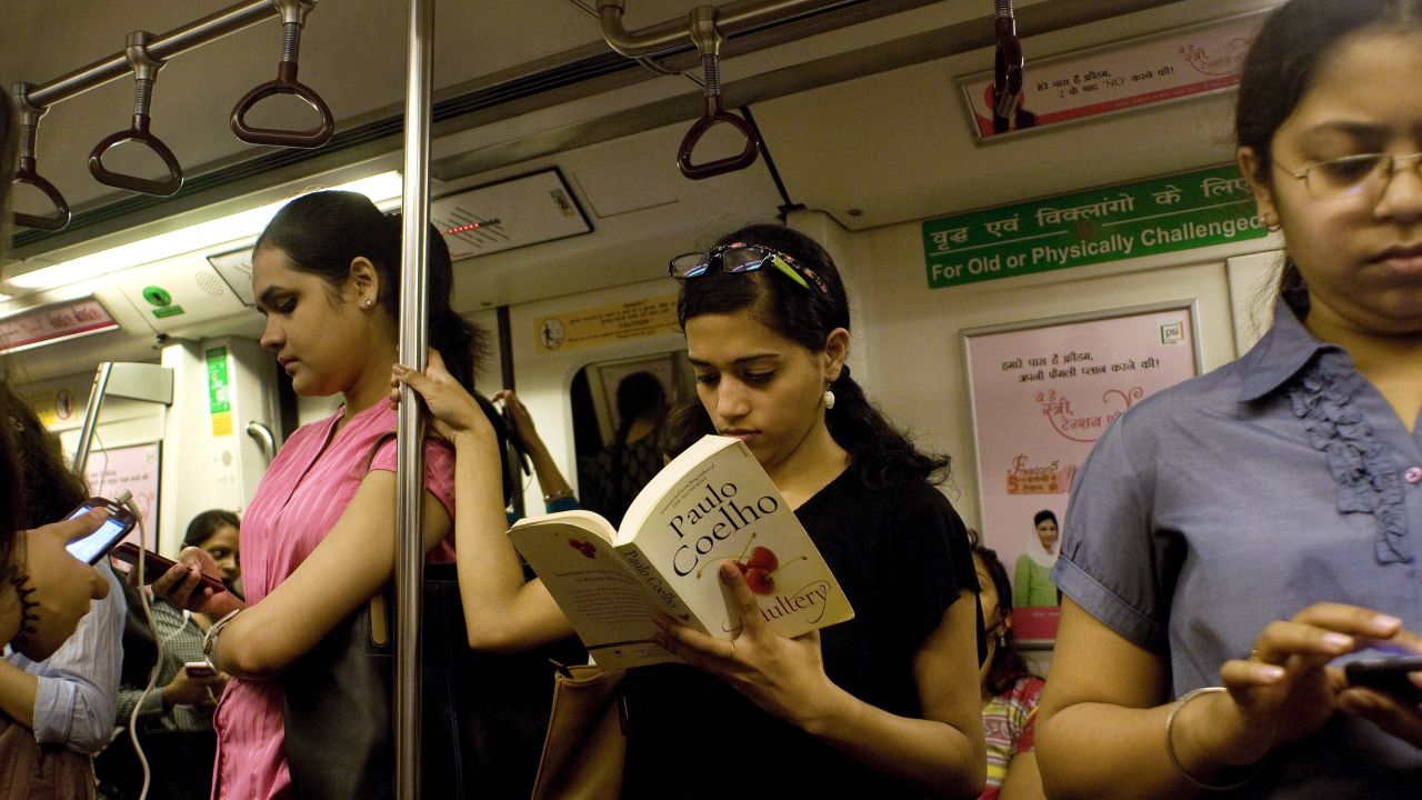 Indian women travel in the metro carriage reserved for women in New Delhi.