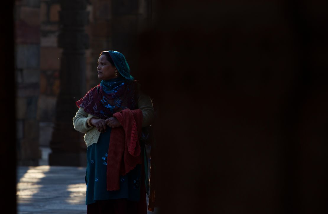 A woman in India's Qutub Minar, a UNESCO World Heritage site in New Delhi.