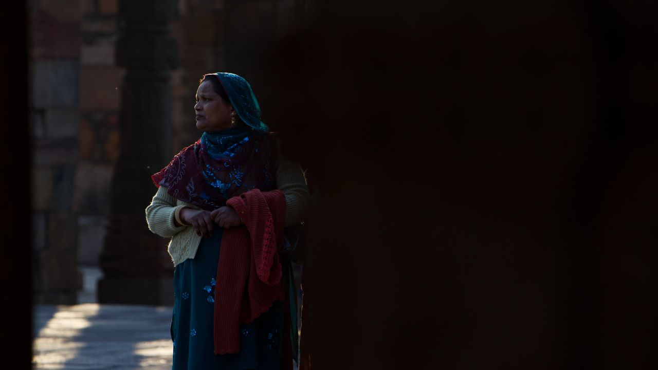 A woman in India's Qutub Minar, a UNESCO World Heritage site in New Delhi.