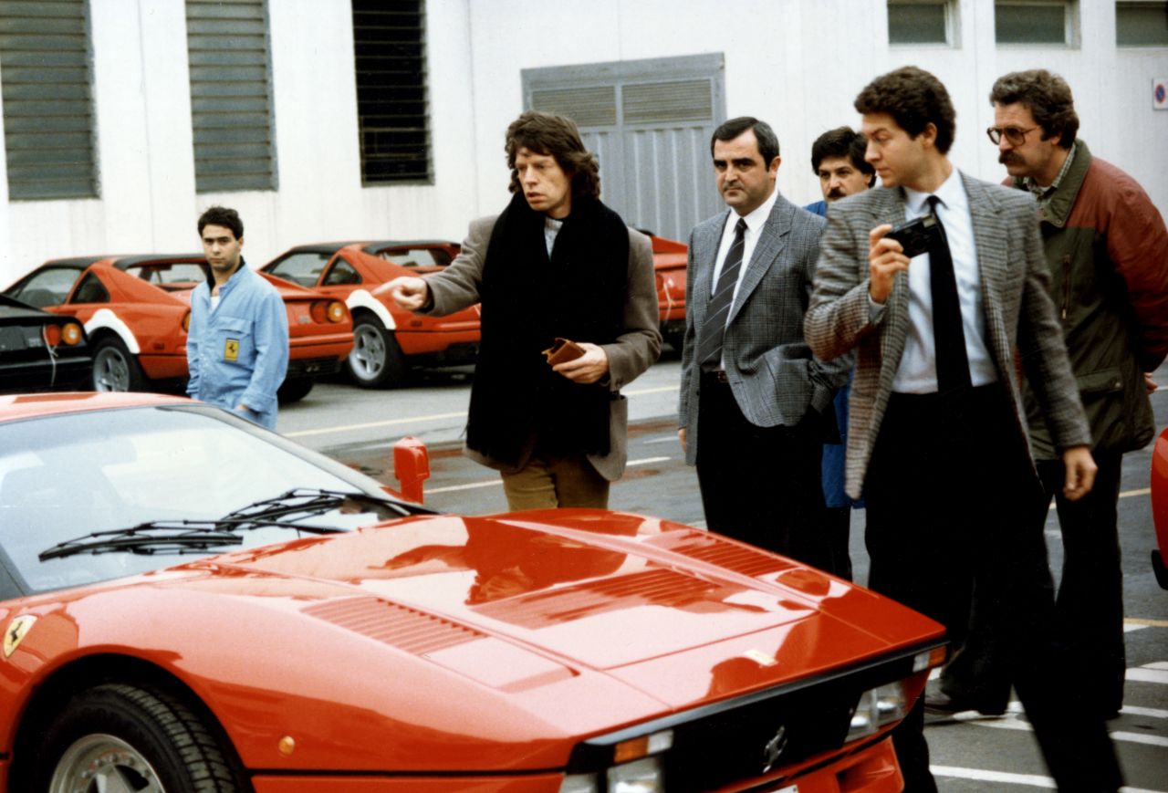 Rolling Stones frontman Mick Jagger, pictured picking up his Ferrari GTO at the factory, was another that added to the magnetism of the brand. 