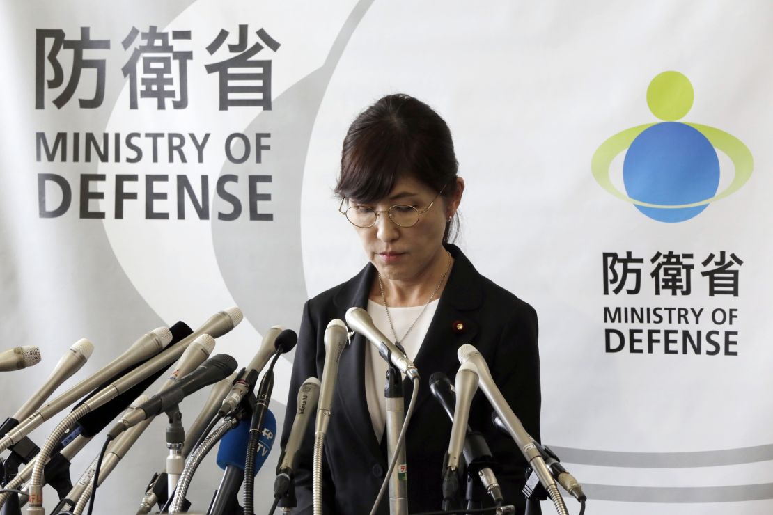 Japan's Defense Minister Tomomi Inada pauses during a news conference on her resignation.